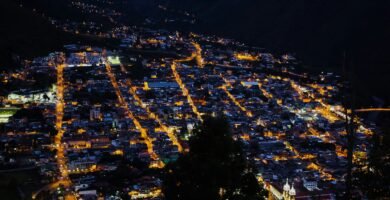 a night view of a city lit up with lights